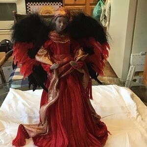 Elegant Holiday Angel with Red Gown and Black Wings